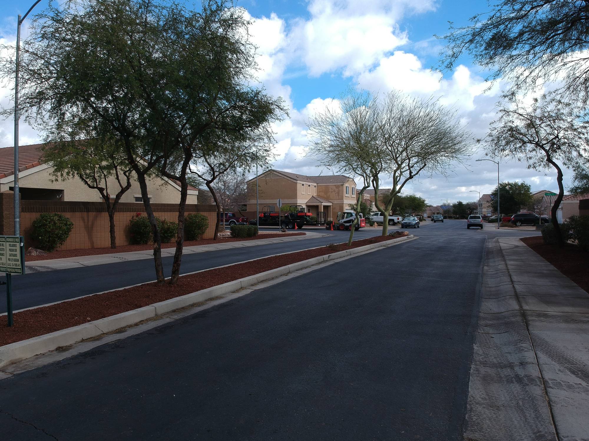 Red decomposed granite along a community street in Phoenix, Arizona